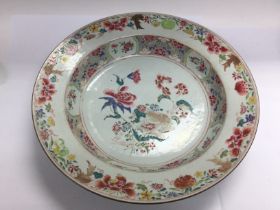 An 18th Century Canton dish with hand painted flor