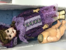A vintage German doll and a doll body (2). Shippin