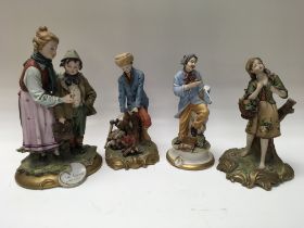 A collection of figures including capodimonte figu