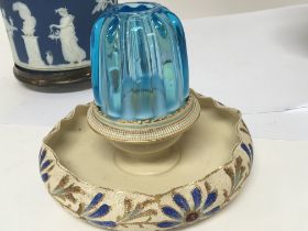 An unusual late Victorian ceramic and glass candle