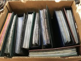 A large box of cigarette cards including albums an