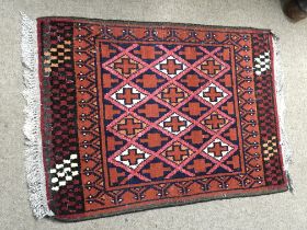 Hand knotted door mat/small rug. 70x50cm Postage category C