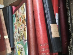 A box containing a collection of GB and World stamps various