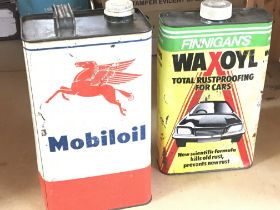 A vintage Mobil oil can (never opened) and wax can