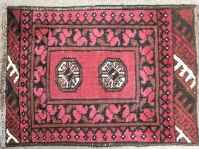 Red Hand knotted floor mat/ small rug. Dimensions 68x50cm