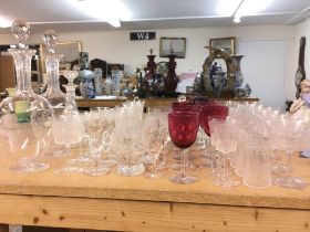 A collection of glass including glasses, decanters