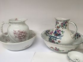 Two decorative ceramic jug and bowl sets one with