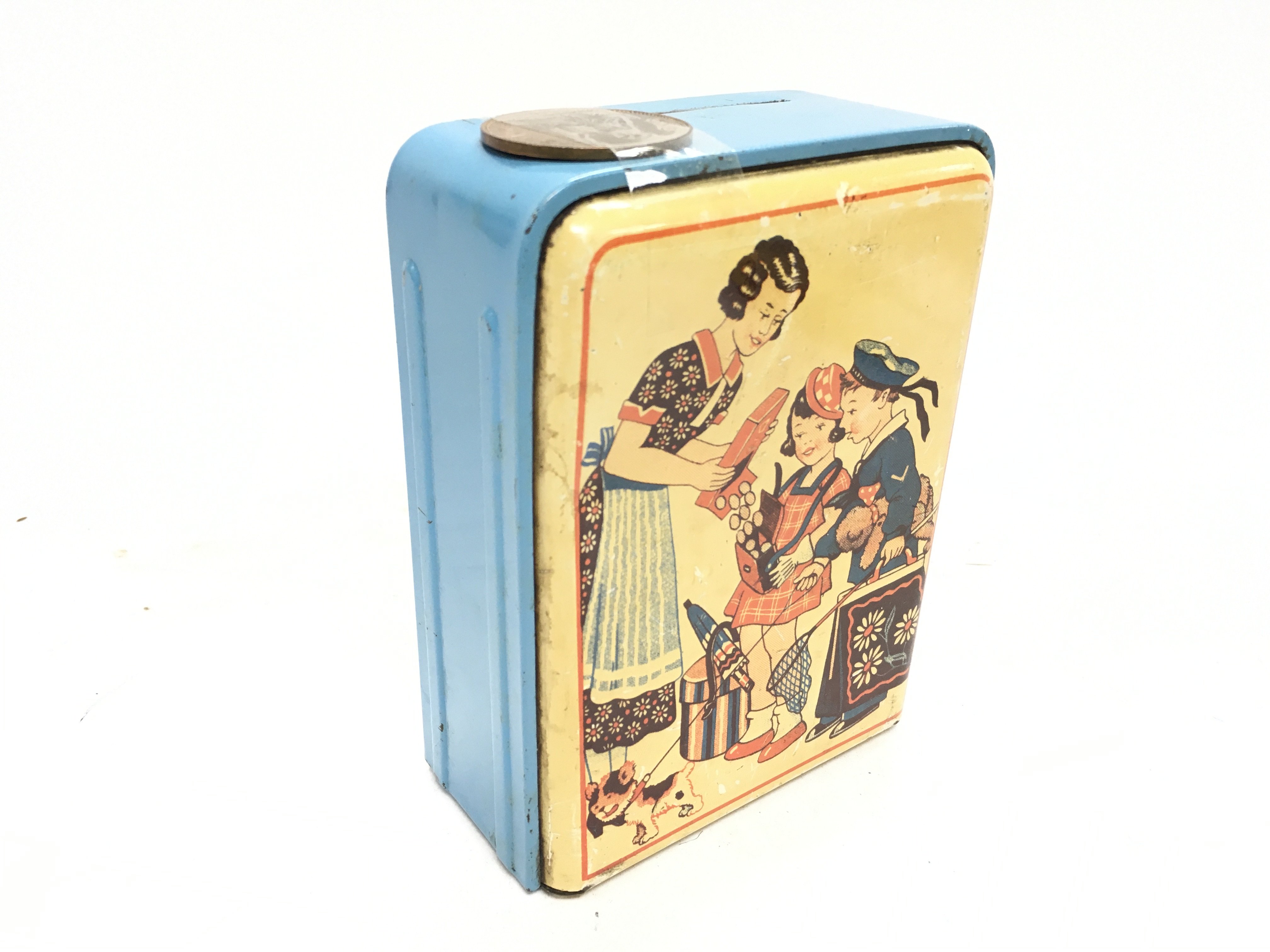 A vintage childs money box. 9.5cm wide and 13cm ta - Image 2 of 3