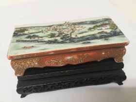 A Chinese enamel decorated brush stand decorated w