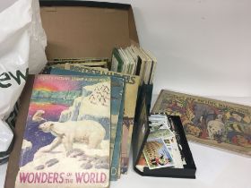 A collection of tea cards a Vintage Cadbury New Pi