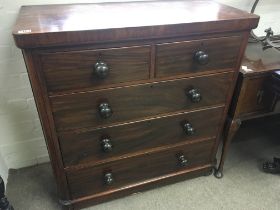 A Mahogany chest of drawers fitted with two short