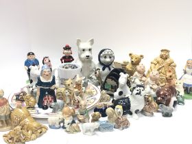 A collection of Wade porcelain figurines including