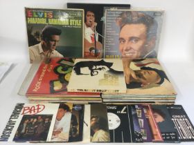 A bag of LPs and 7inch singles by various artists