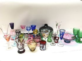 A large collection of coloured art glass including