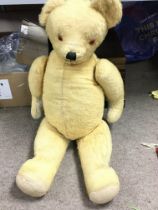 A large vintage Teddy bear, approximately 70cm lon