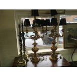 A pair of gilt wood rococo influence electric cand