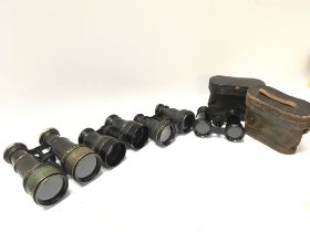 Pairs of vintage binoculars including Lumiere Pari