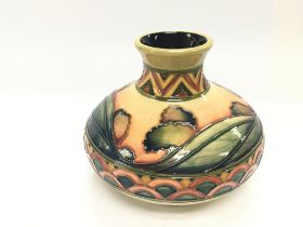 A Moorcroft Trial vase T/D01608. 11cm tall and in