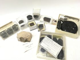 A collection of meteorites including Tektite, Cond