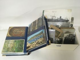A collection of photographs and postcards includin