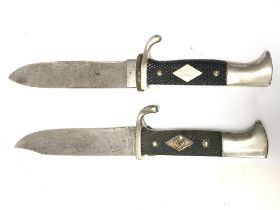 A pair of Hitler Youth style knives, one with Swas