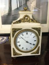 An Elkington marble clock with gilt mounts. Shipping category D.