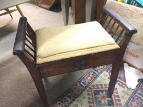 A carved music stool. Shipping category D.