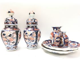 19th century Japanese Imari porcelain vases (28cm tall) and plates. No obvious large damage or