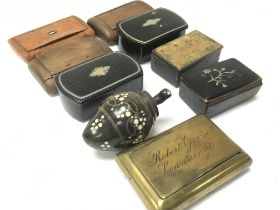 A collection of various Victorian snuff boxes incl
