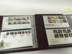 Two albums containing Ryal Mail first day covers a