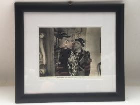 A framed and glazed signed Laurel & Hardy lobby ca