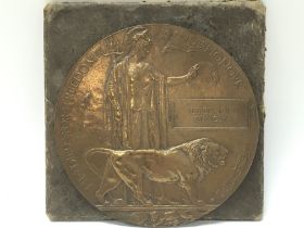 A bronze WW1 Death penny dedicated to Alfred John