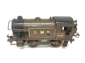 A LMS O gauge clockwork train made by Hornby. Post