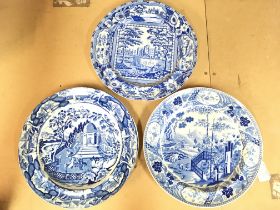 Three 19th century blue and white plates. One wedg