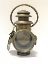 An early brass Bleriot Paris car paraffin lamp and