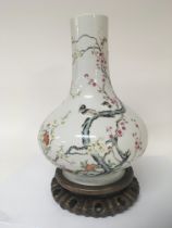 A Chinese porcelain bottle vase enamel decorated w