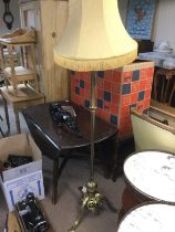 A late 19th Century brass telescopic standard lamp. Shipping category D.