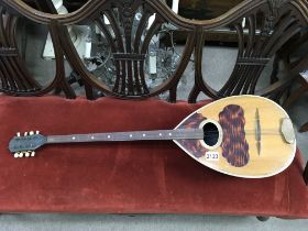 A vintage long necked mandolin, 97cm.