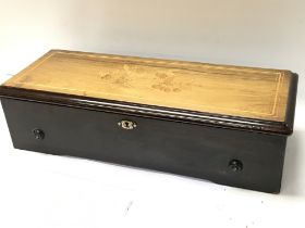 A Rosewood Victorian music box, with an inlaid top