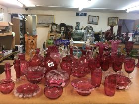 A large collection of Victorian cranberry glasswar