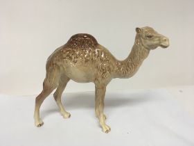 A Beswick ornament in the form of a camel. No obvi