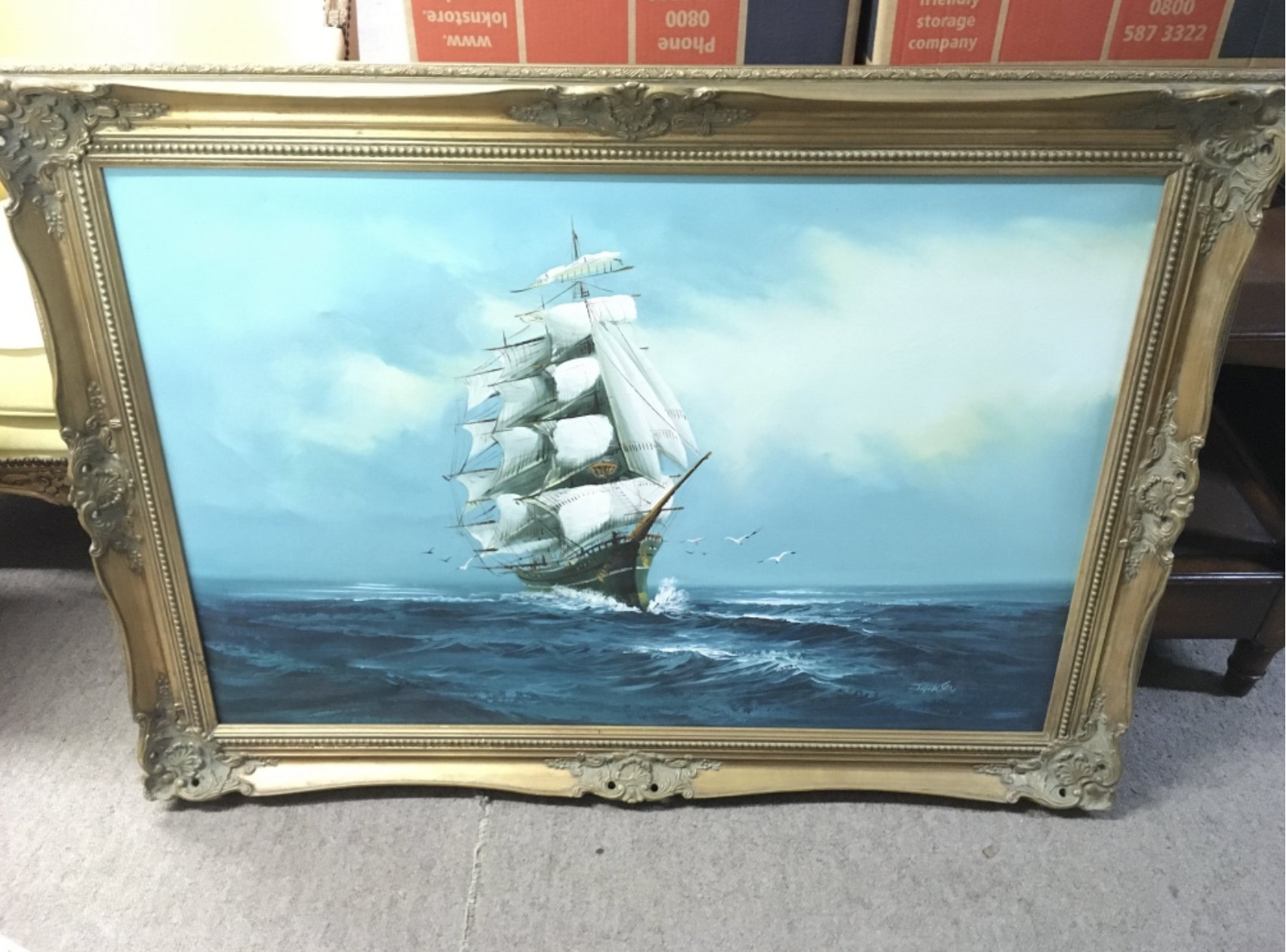 A modern Oil on canvas depicting a sailing ship at
