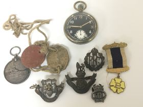 A collection of Military badges A George V Navy Me