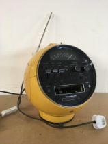 A 1970's Yellow PrinzSound radio in the form of a