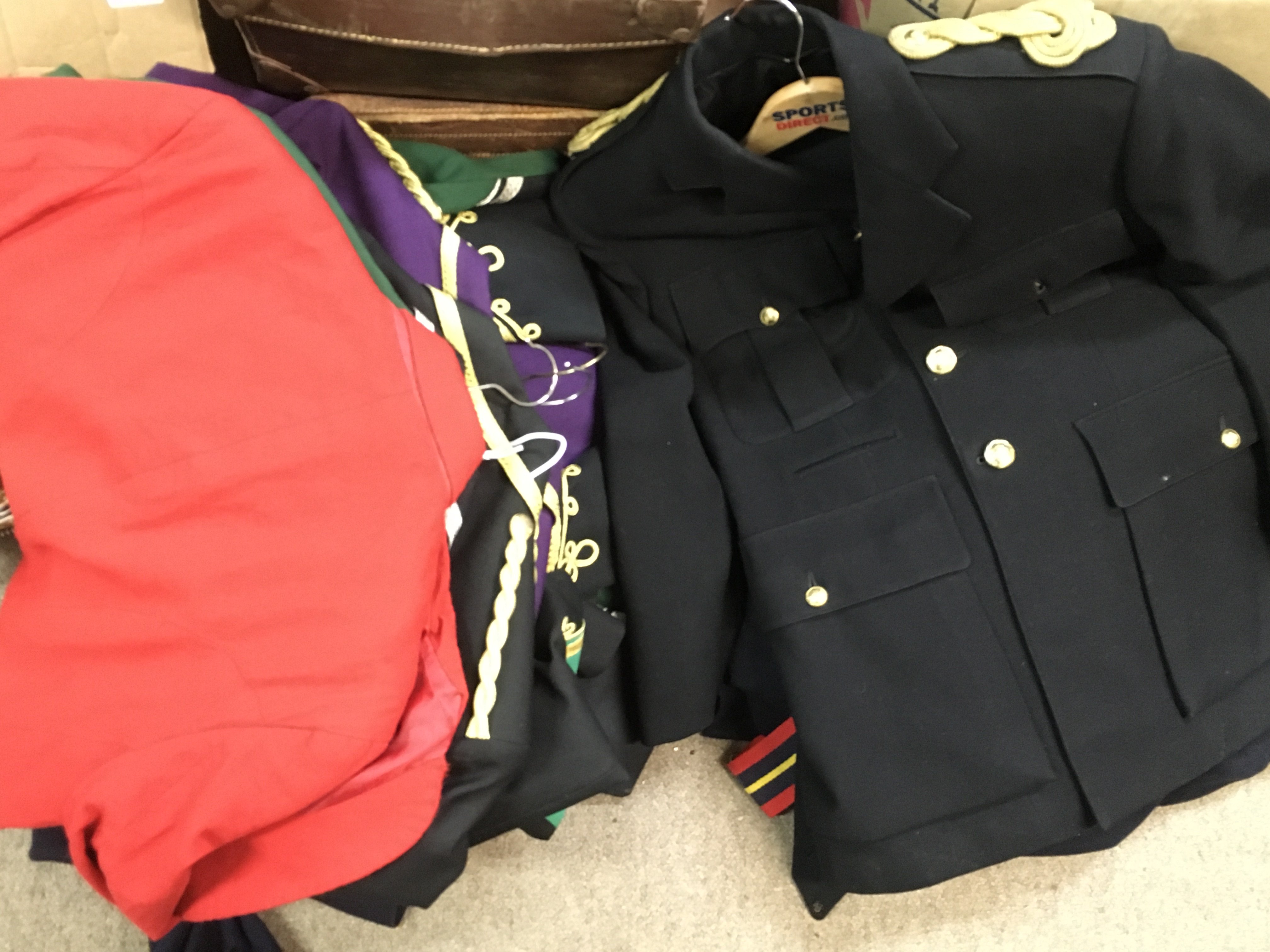 A collection of military uniforms including