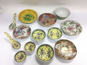 A collection of Oriental dishes and spoons. Shippi