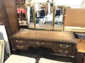 A mid 20th century teak dressing table with mirror