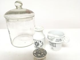 A Very old Smith Crisps storage jar hand blown glass and the lid with cut and coloured engraving