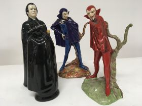 Two Carlton ware figures Mephisto a Wade Sandeman figure and Wade Dracula figure no obvious damage.