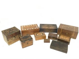 A Collection of wooden trinket boxes with various